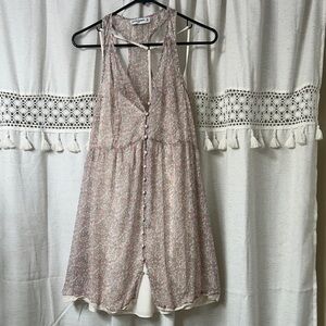 Sleeveless Pink Floral Mini Dress with Button Front